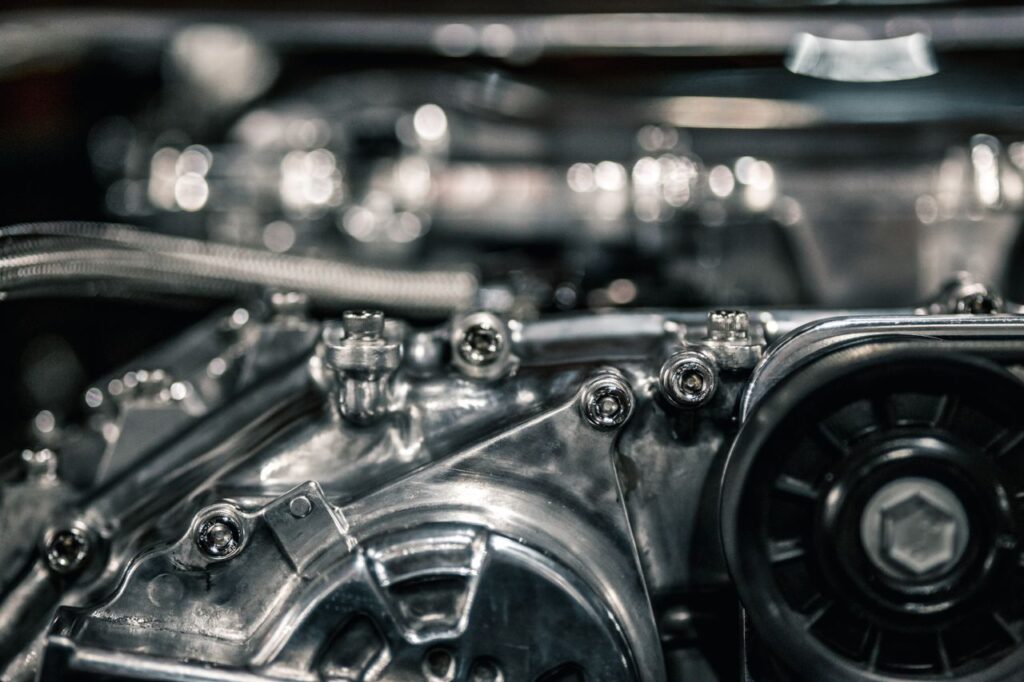Shiny new engine and details with screws and bolts of new modern car